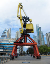 Low angle view of construction site against sky