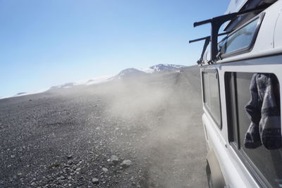 Close-up of mid adult man against sky