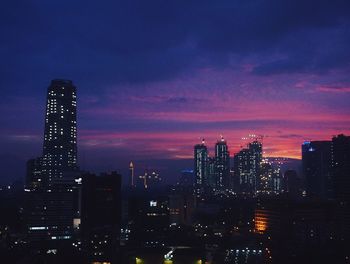 Illuminated cityscape at night