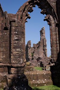 Old ruin building against clear sky