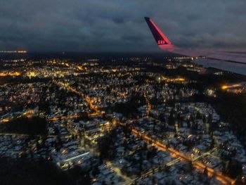 Aerial view of city against sky