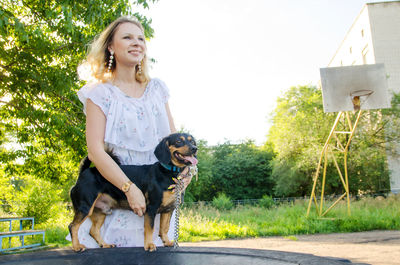 Happy woman with dog