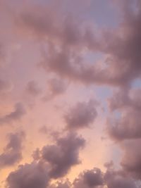 Low angle view of cloudy sky during sunset