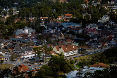 High angle view of townscape and trees in town