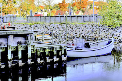 Boats moored in water