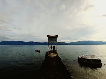 Scenic view of bay against sky