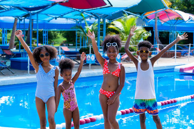 People enjoying in swimming pool