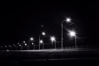 Illuminated street light at night