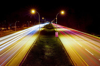 Light trails on road at night