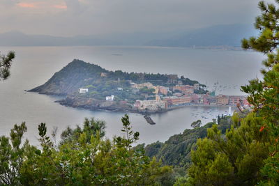 High angle view of townscape by sea