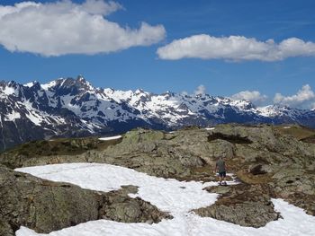 Scenic view of snowcapped mountains against sky