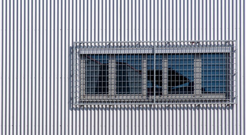 Full frame shot of window on wall of building