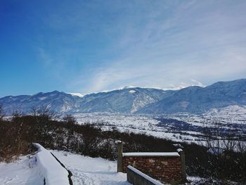 Scenic view of mountains against sky during winter