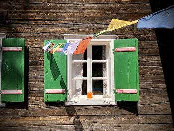 Green shutters on traditional austrian alpine house