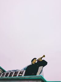 Low angle view of statue against clear sky