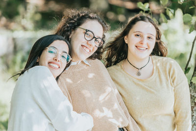 Portrait of smiling females outdoors