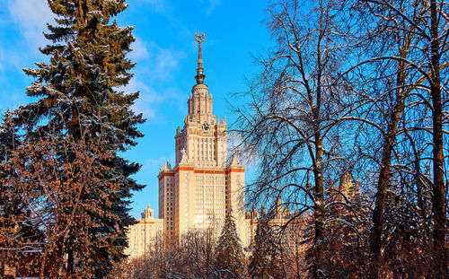 Sunny winter campus of moscow university under blue sky