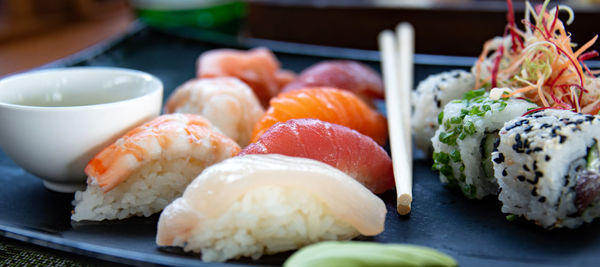 Close-up of sushi served on table