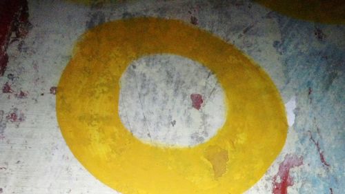 Close-up of yellow art