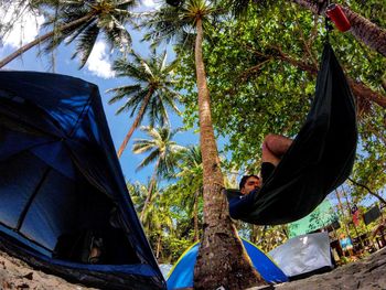 Low section of men sitting outdoors
