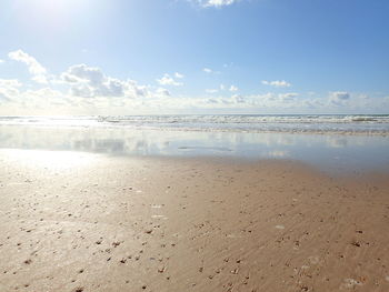 Scenic view of beach against sky