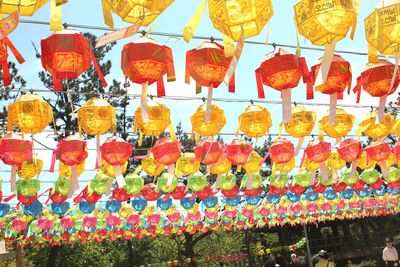 Low angle view of lanterns hanging in row