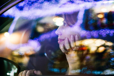 Close-up of woman in car