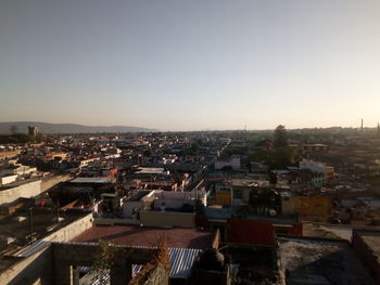 High angle view of cityscape against clear sky