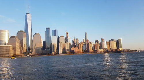 Modern buildings in city against sky