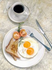 High angle view of breakfast served on table