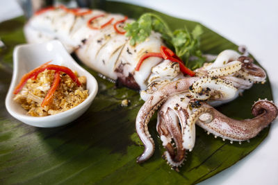 Close-up of food served on table