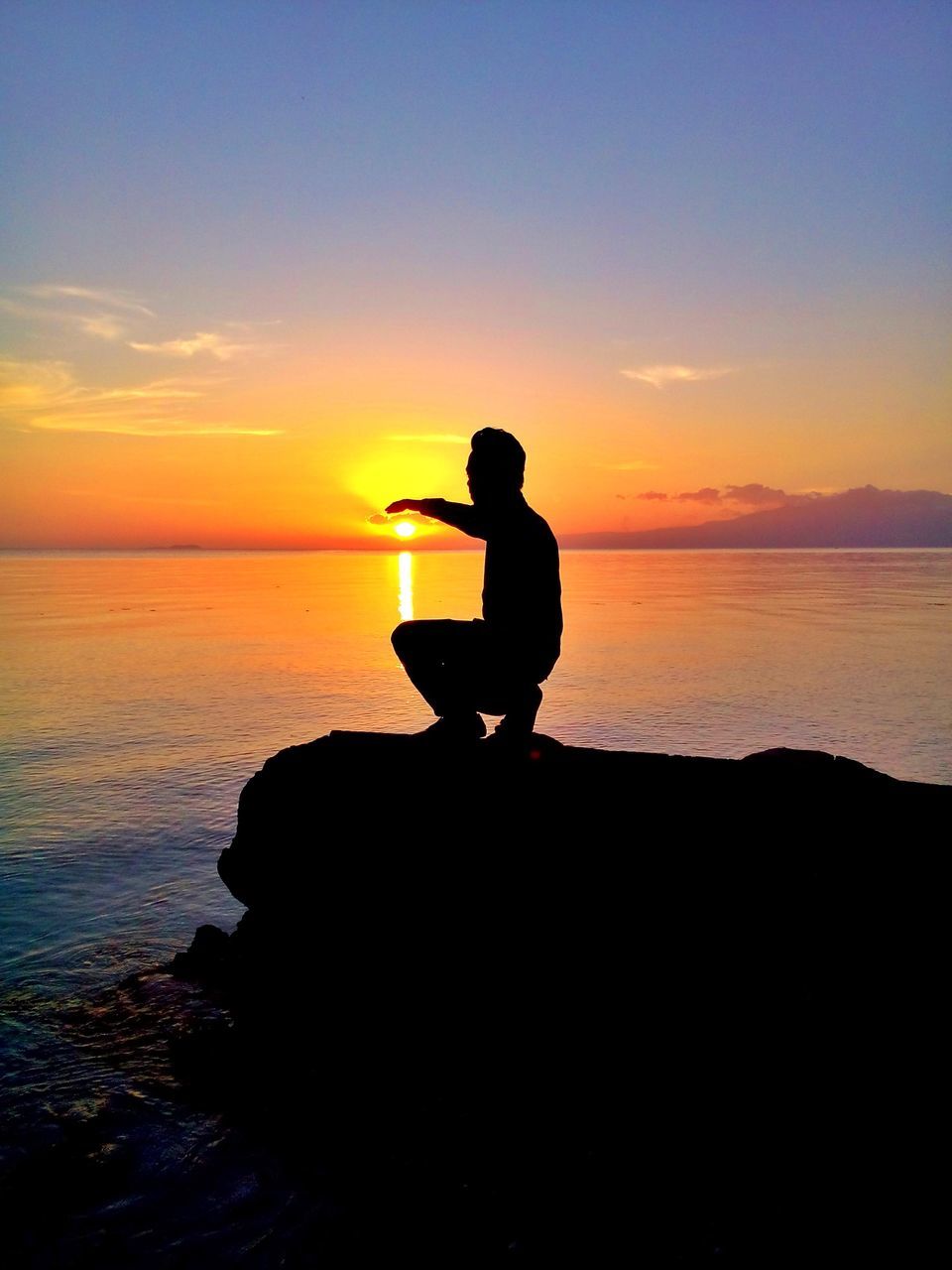 silhouette, sunset, water, sea, horizon over water, sky, standing, lifestyles, leisure activity, scenics, beauty in nature, tranquil scene, tranquility, men, orange color, idyllic, beach, nature