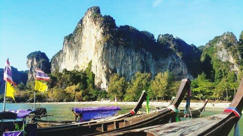 Scenic view of sea with mountain in background