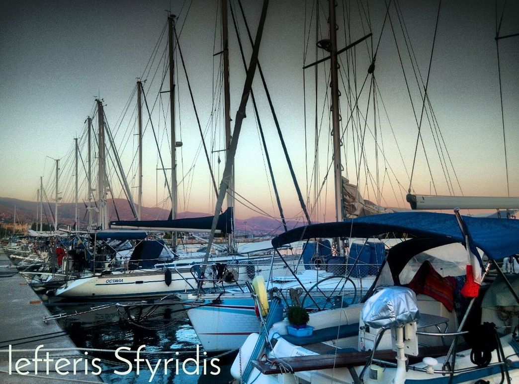 nautical vessel, water, transportation, sky, sea, mode of transportation, moored, sailboat, mast, harbor, nature, pole, day, no people, clear sky, sunset, travel, yacht, port, marina