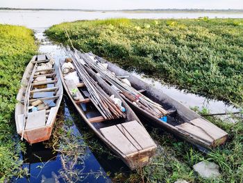 High angle view of boats moored on land