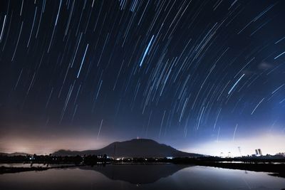 Scenic view of star field against sky at night