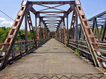 Footbridge against sky