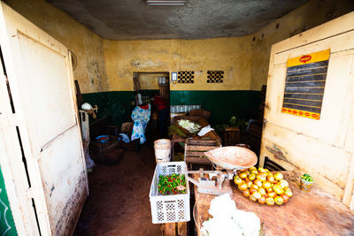 Various fruits on table against wall at home