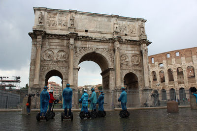 Group of people in front of historical building