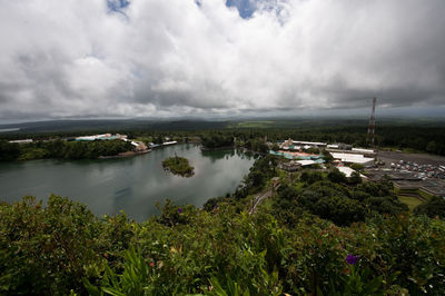 Scenic view of landscape against cloudy sky