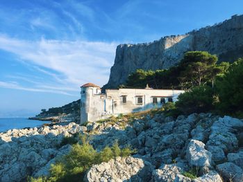 Castle on the rocks by the ocean in sicily