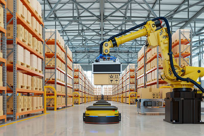 Robotic arm for packing with producing and maintaining logistics systems.3d rendering