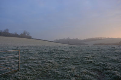 Scenic view of sea against clear sky during winter