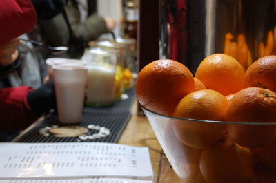 Close-up of orange fruits on table