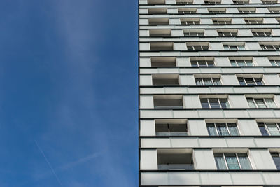 Low angle view of building against blue sky