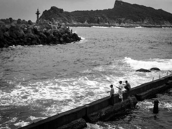 Man fishing in sea