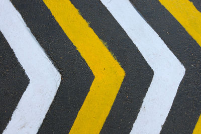 High angle view of road markings on road