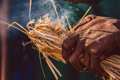 Closeup of man making fire