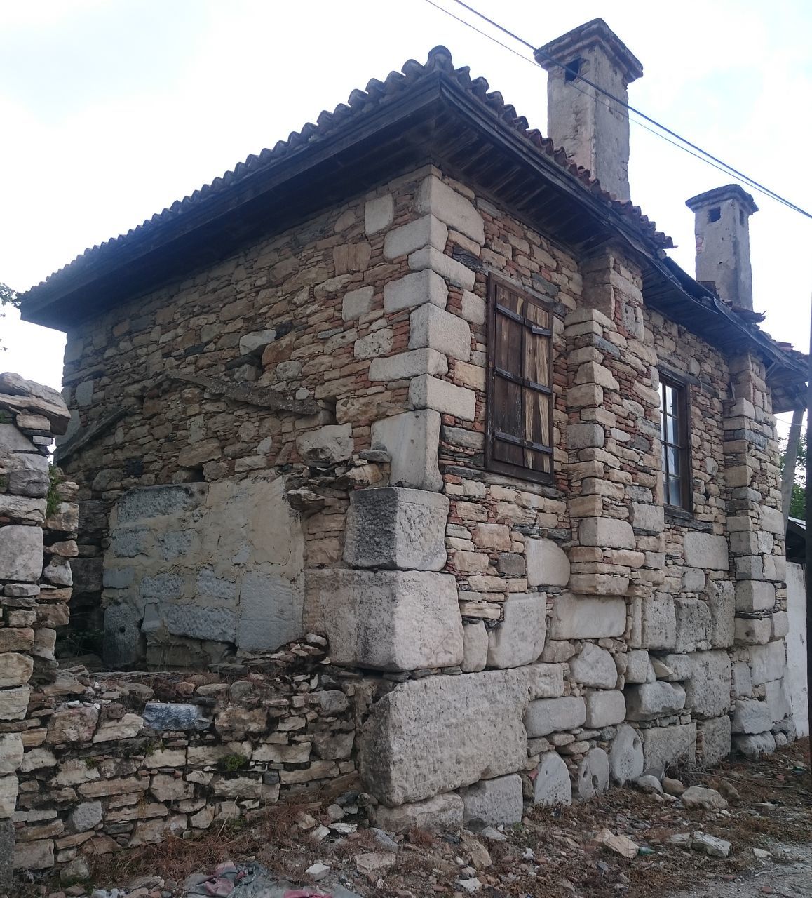 architecture, building exterior, built structure, old, brick wall, abandoned, stone wall, low angle view, weathered, damaged, wall - building feature, obsolete, sky, window, run-down, deterioration, history, house, building, bad condition