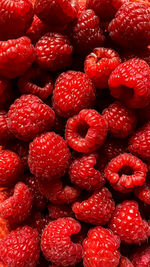 Raspberry background. full frame textured berry background. healthy lifestyle and eating concept